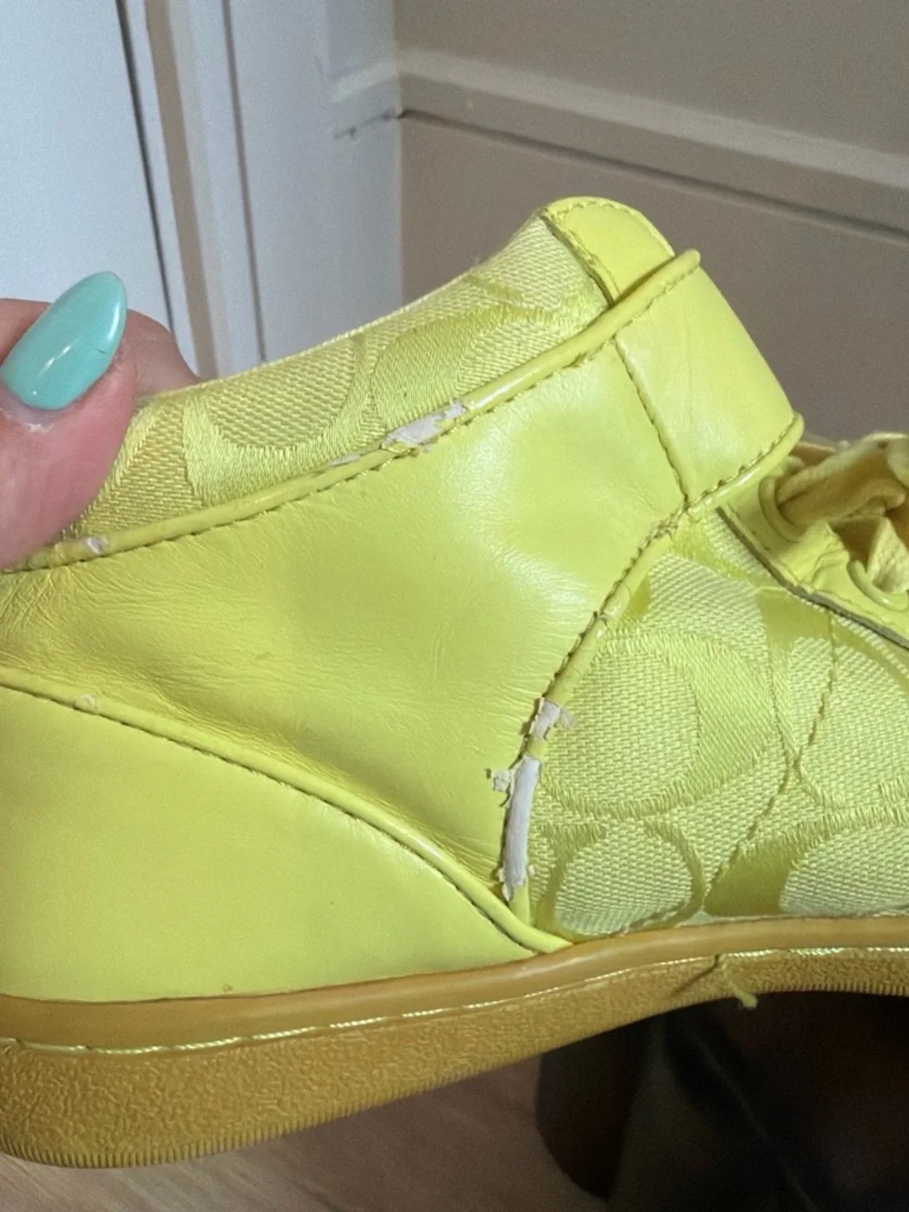 Yellow coach high top sneakers